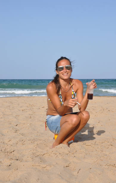 istock Enjoying a Smoke and Drink 849906690