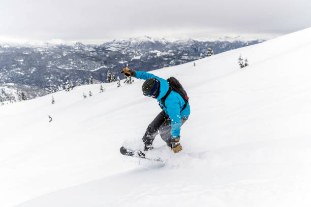 istock Snowboarder in Action in Fresh Powder Snow 849916712