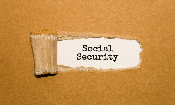 istock The text Social Security appearing behind torn brown paper 849921078