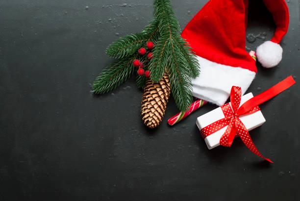 istock Christmasgift box,  branches, candy, beads, cones,  Christmas background. 849921132