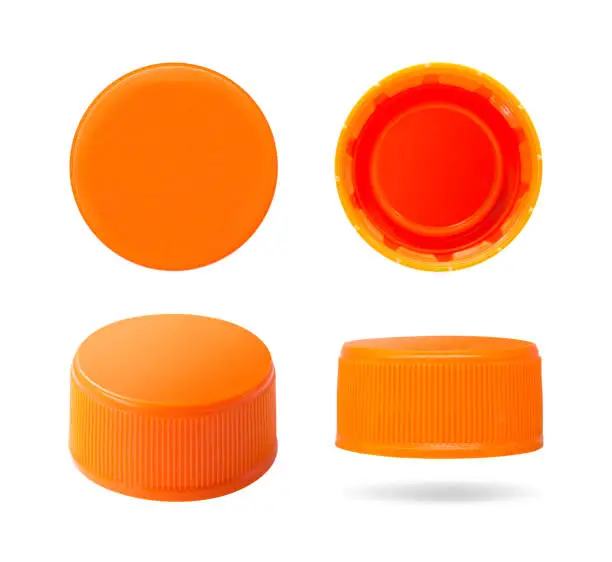 Photo of Plastic bottle cap isolated on white background. Group of beverage lid for your design. Clipping paths object.