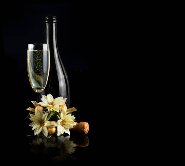 Valentine's Day Red Roses and White Wine with a Gift on an Old Wood Background