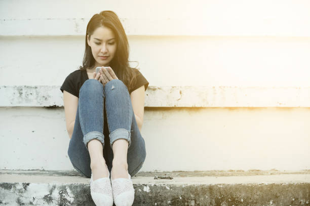 istock young hipster woman looking using at the smart phone 849948894