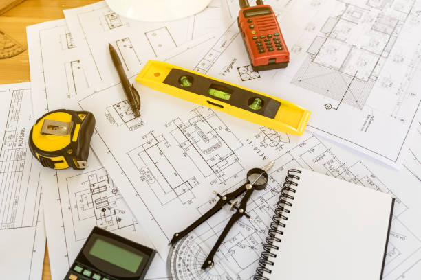 istock Vintage business desk of engineer contractor. 849953080