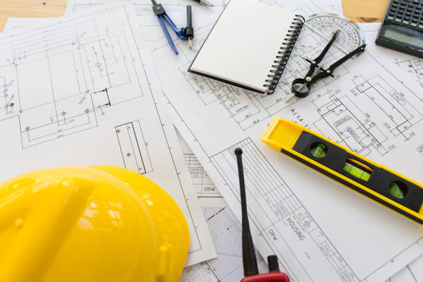 istock Vintage business desk of engineer contractor. 849969914