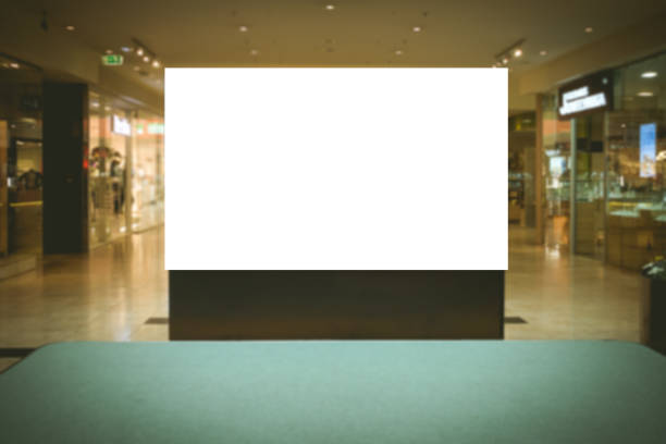 istock Mock up. Blank billboard, advertising stand in modern shopping mall. 849970404