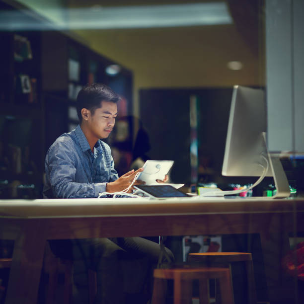 istock asian businessman working with tablet 849973306