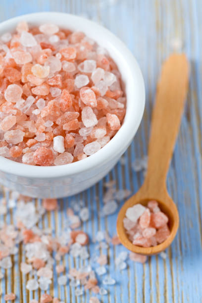istock Himalayan pink salt on wooden surface 849999716
