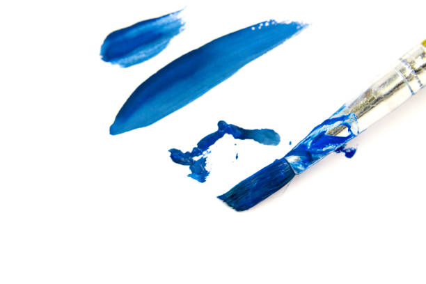 istock Smears with a blue paint brush on white paper. Gouache 850049174