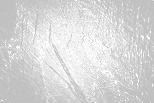 istock The old wood texture with natural patterns and cracks on the surface as background. White tone 850049398