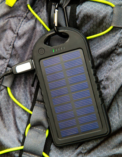 istock Portable solar cell hanging on tourist backpack 850050056