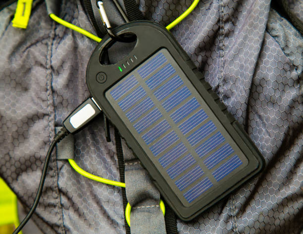 istock Portable solar cell hanging on tourist backpack 850050126