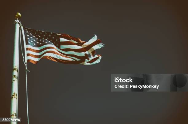 Tattered American Flag Rusty Flagpole Stock Photo - Download Image Now - American Flag, Torn, Run-Down
