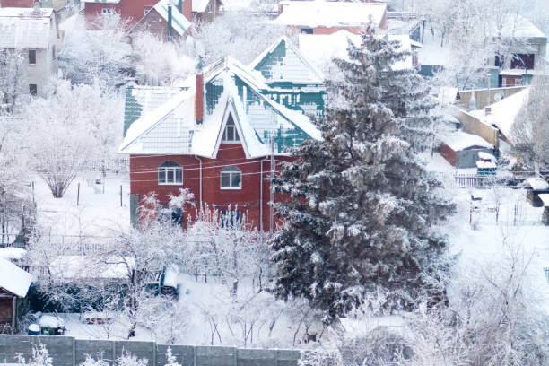 istock snowy winter in a cottage village 850113078