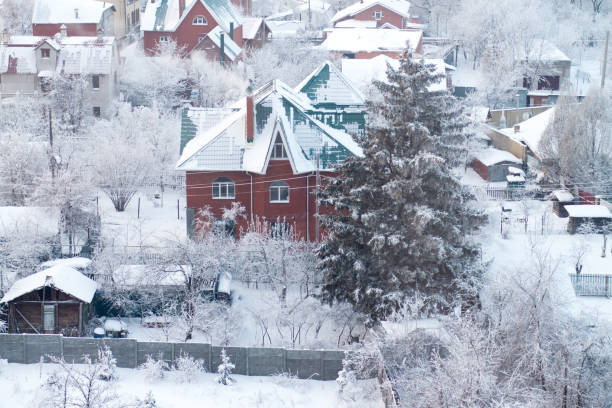 istock snowy winter in a cottage village 850113092