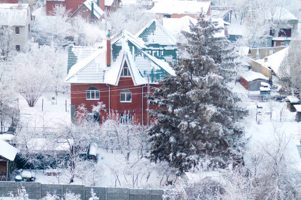 istock snowy winter in a cottage village 850113136
