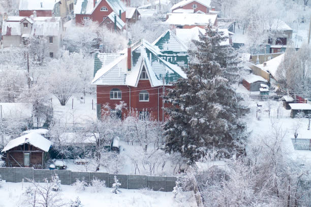istock snowy winter in a cottage village 850113534