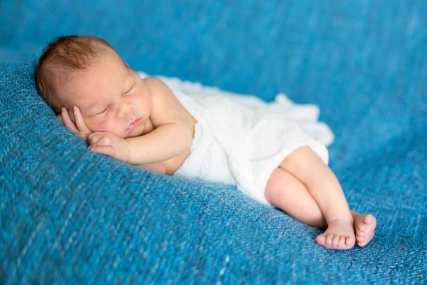 istock Newborn baby boy, sleeping happily 850114506