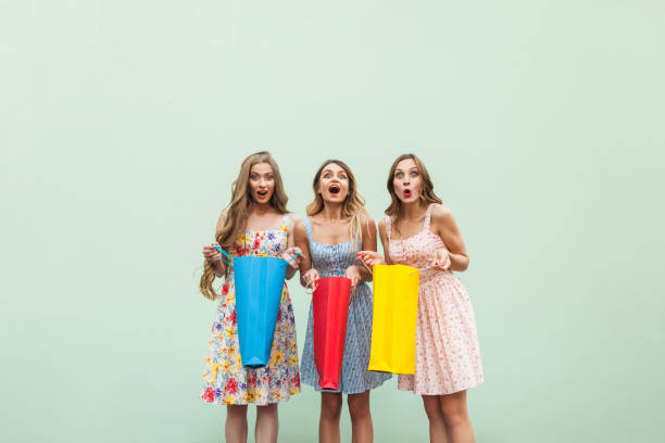 istock Three beautiful woman after shopping 850137326