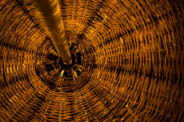 close up straw beach umbrella against sunshine