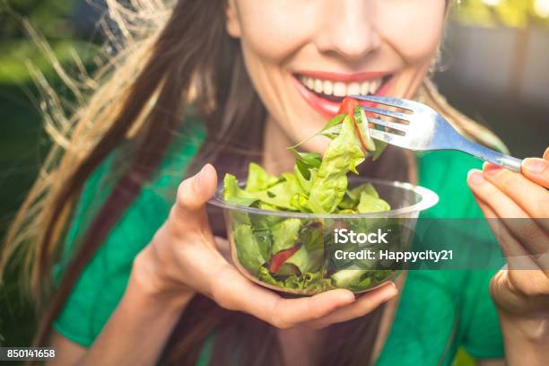 Woman Eating Healthy Salad Stock Photo - Download Image Now - Eating, Salad, Healthy Eating