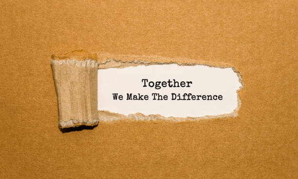 istock The text Together We Make The Difference appearing behind torn brown paper 850142088