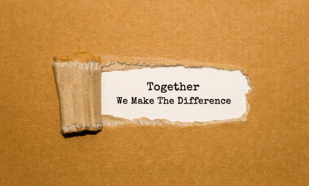 The text Together We Make The Difference appearing behind torn brown paper The text Together We Make The Difference appearing behind torn brown paper charity and relief work stock pictures, royalty-free photos & images
