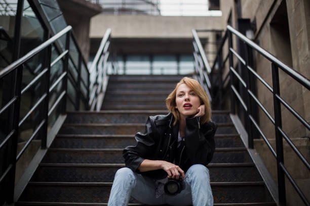 istock Blond artist girl with camera 850150484