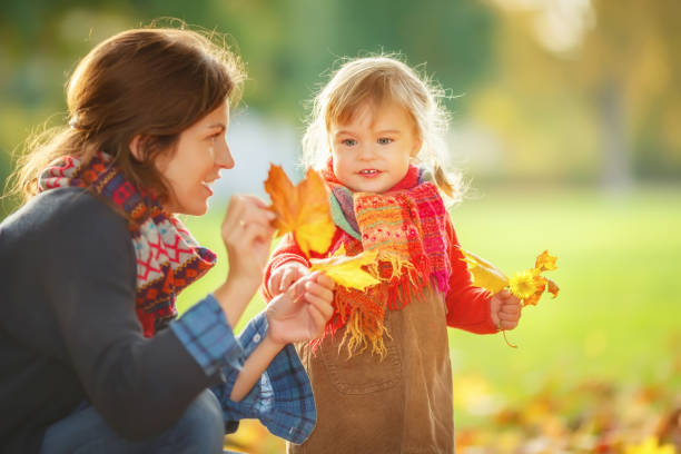 istock Mother and daughter in the park 850170058