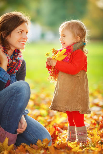 istock Mother and daughter in the park 850170132