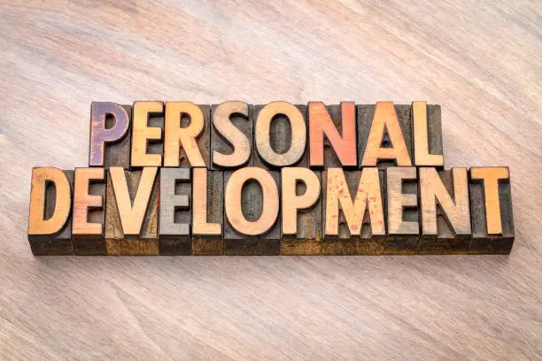 personal development - word abstract in vintage letterpress wood type printing blocks