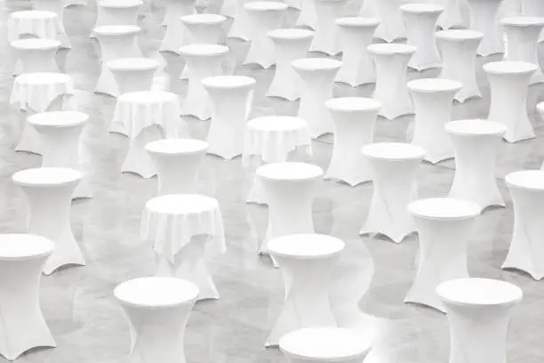 Many white round tables, celebration concept, banquet concept, conference concept, texture background, blank