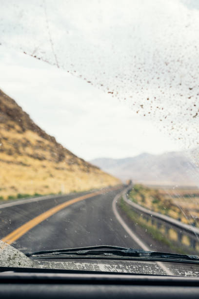 istock Road through the dirty truck windshield 850182262