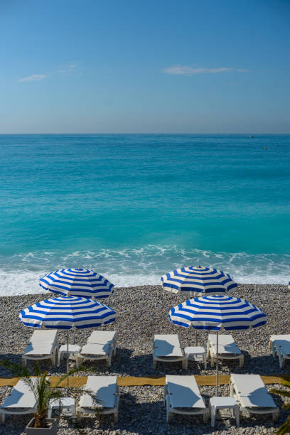Colofrul parasol in the beach of the French city Nice in the French riviera