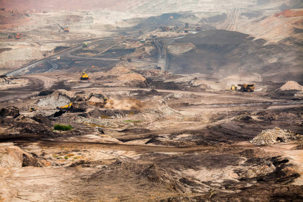 istock Part of a pit with big mining truck working 850187734