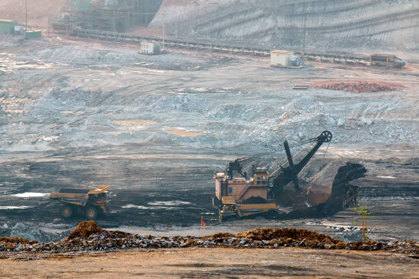 istock Part of a pit with big mining truck working 850188006