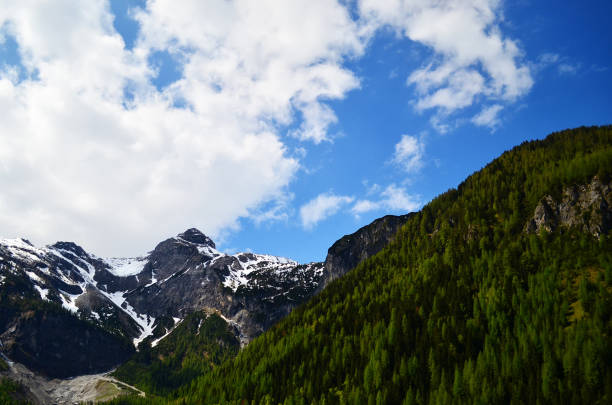 istock Mountain with snow in a sunny day with blue sky 850194750