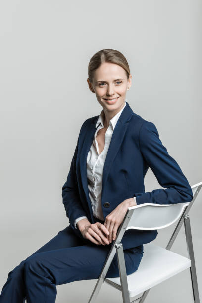 istock smiling businesswoman in suit 850199390
