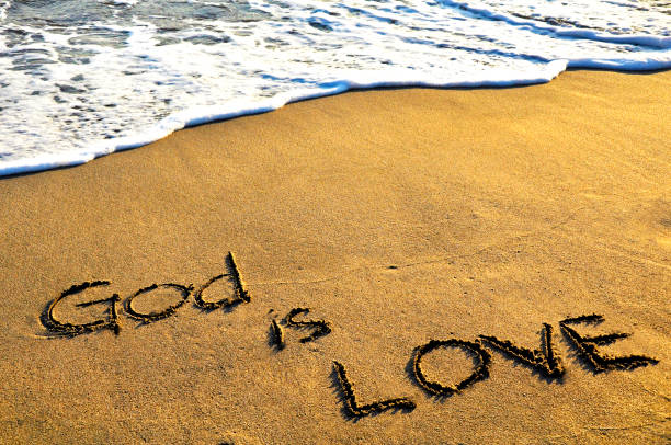 God is Love God is love text on beach and wave indian ocean islands stock pictures, royalty-free photos & images