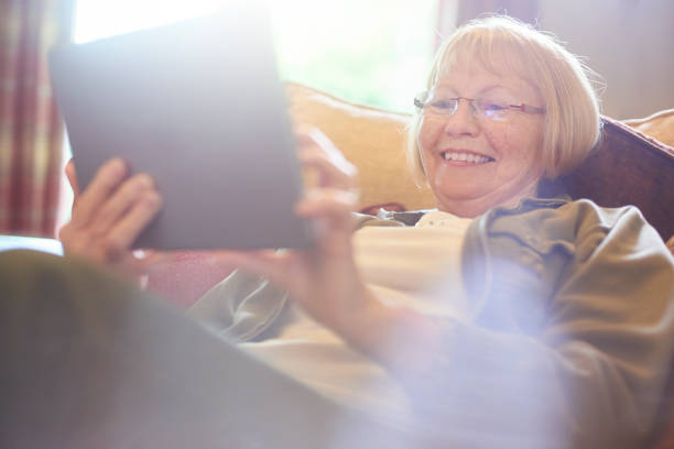 istock senior woman using social media 850201054