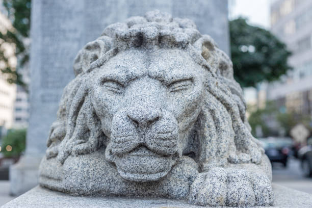 istock lion head statue city environment squinning eyes strength calm guard 850204854