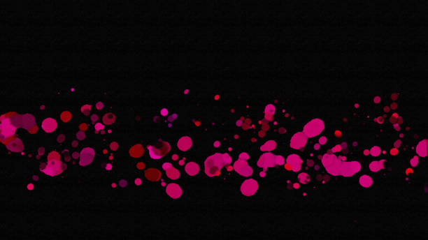 Abstract artistic ink or watercolor background with hand painted pink and crimson red paint splatters on black textured paper. Digital art painting for border frame design.