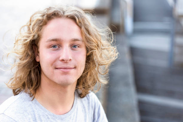 Portrait Of Young Man With Long Curly Hair Copy Space Stock Photo -  Download Image Now - iStock