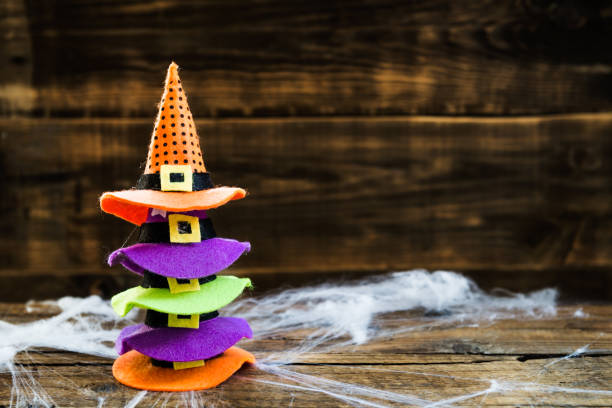 istock Halloween card concept with cute little witch hats 850304170