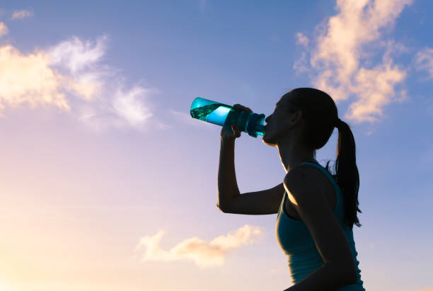 istock Woman drinking water 850304338