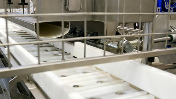 istock Food factory automated robotic conveyor line 850328038