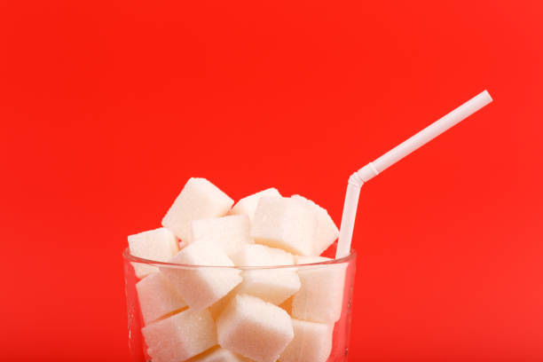 istock Glass full of sugar cubes 850334494