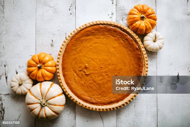 Pumpkin Pie On Rustic Background Stock Photo - Download Image Now - Pumpkin Pie, Pumpkin, Sweet Pie
