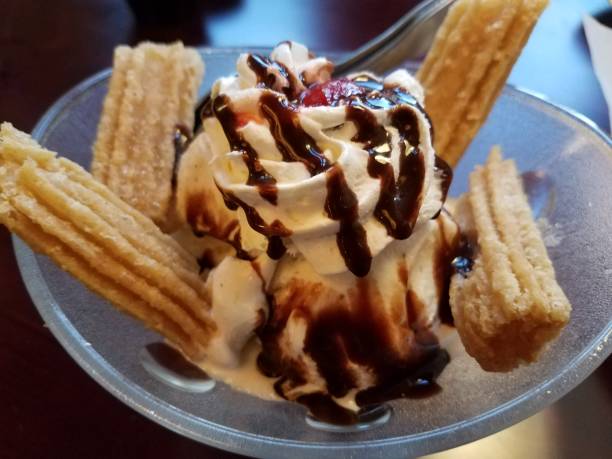 istock vanilla ice cream with chocolate in a glass 850343264