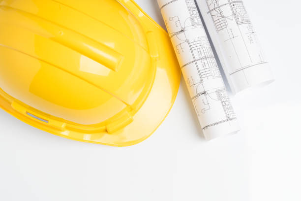 istock office desk with helmet on white background 850346536